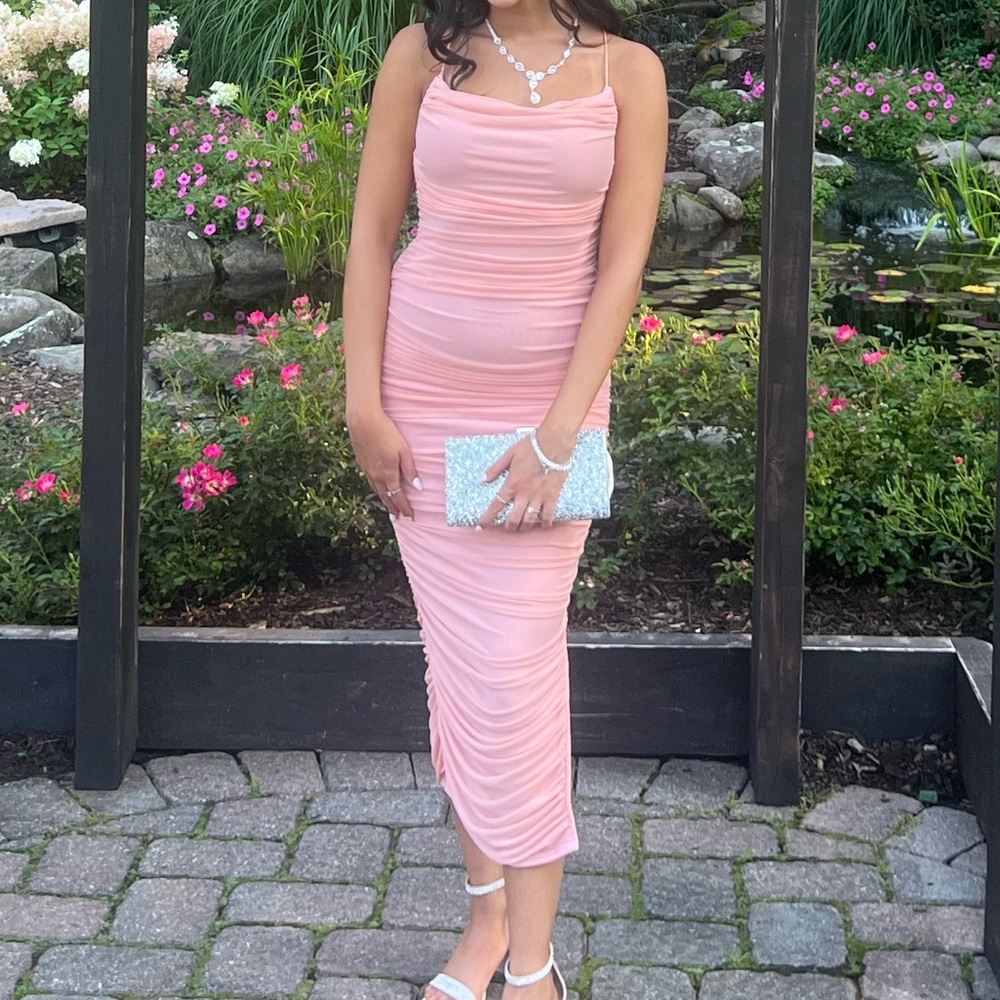 Pink midi dress from a boutique